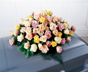 Peaceful Tribute Casket Spray from Visser's Florist and Greenhouses in Anaheim, CA